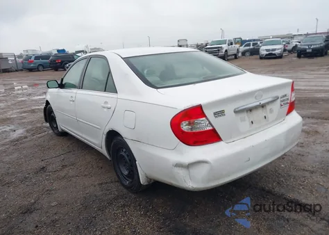 2002 Toyota Camry Le from USA, damaged, VIN JTDBE32K920110820